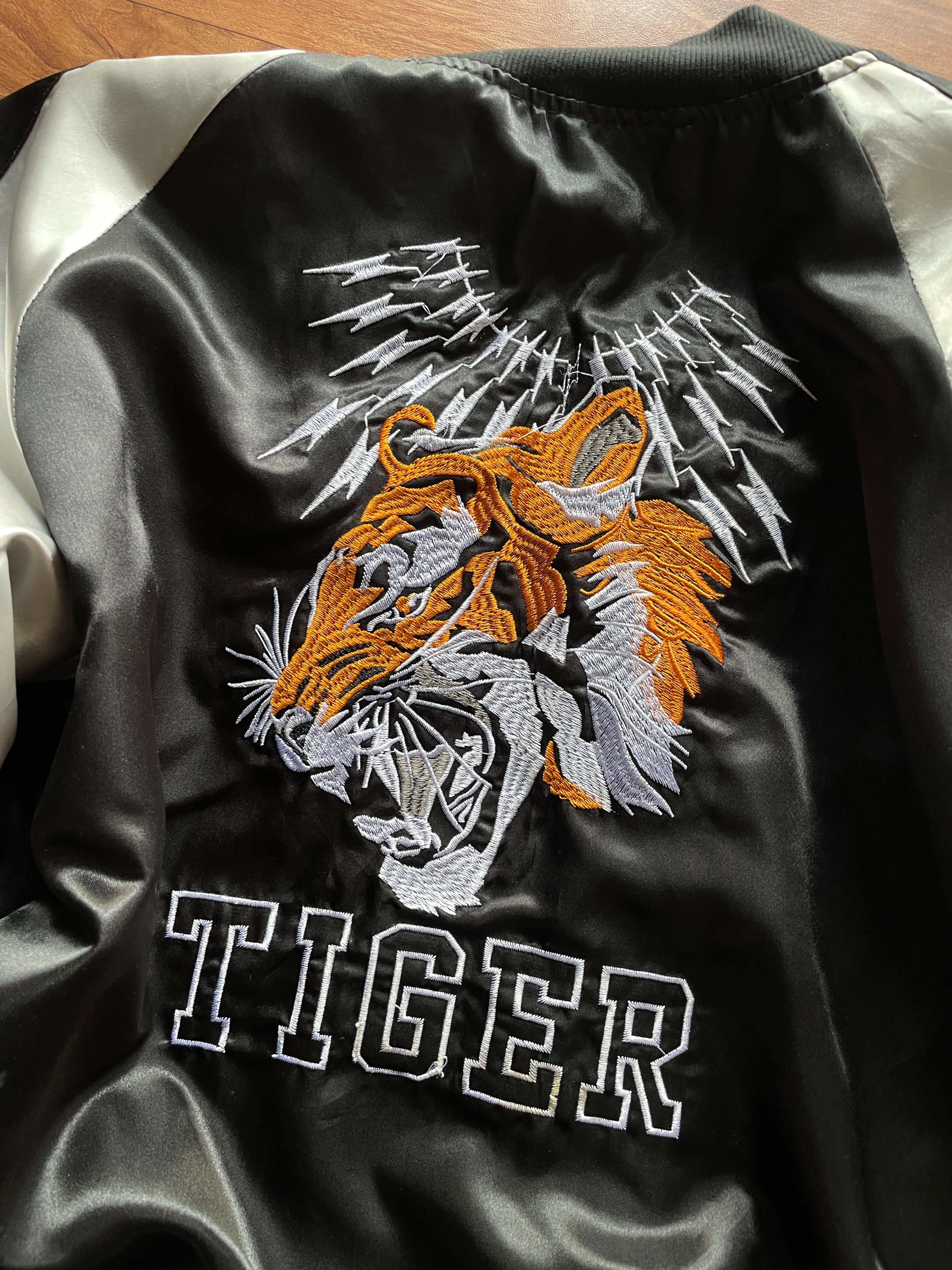 satin bomber-style souvenir jacket